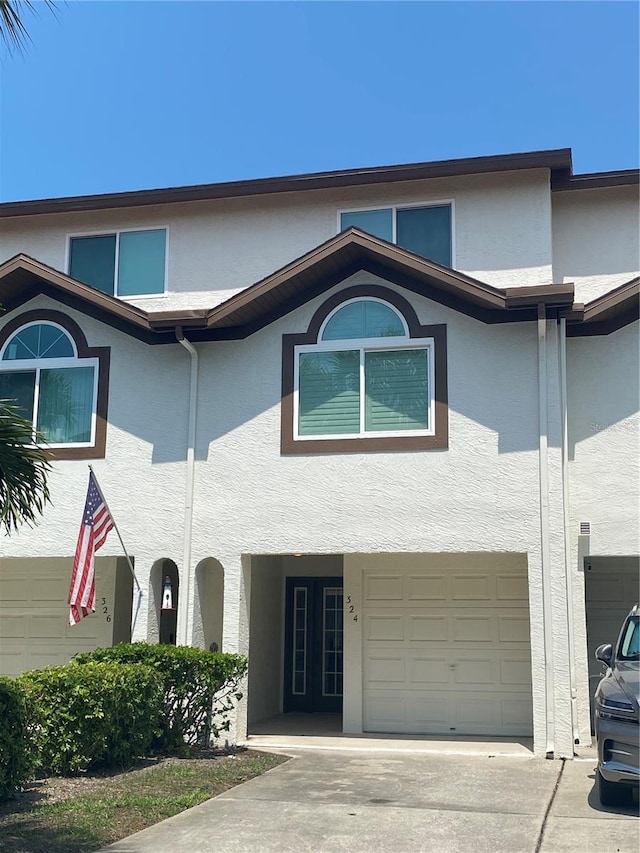 view of front of property with a garage