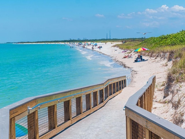 view of water feature with a beach view