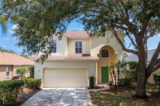 view of front of home with a garage