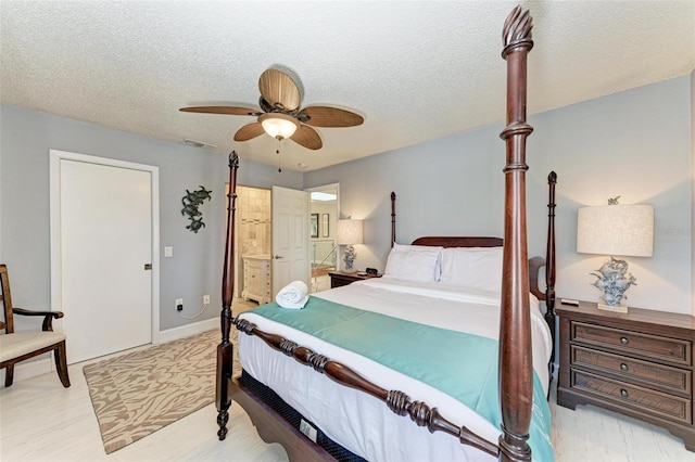 bedroom featuring connected bathroom, ceiling fan, and a textured ceiling