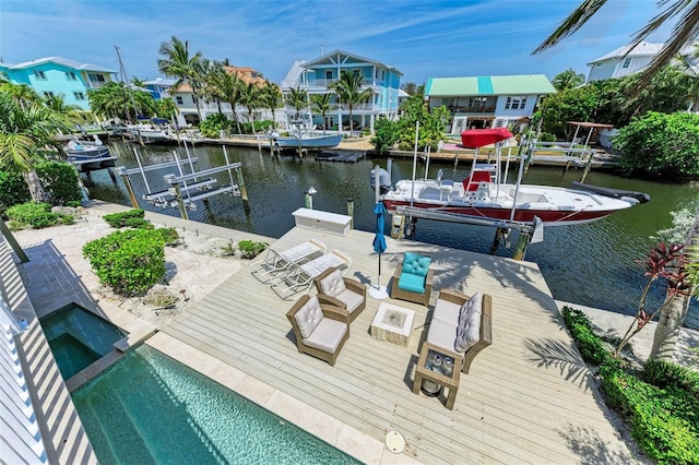 dock area featuring a water view