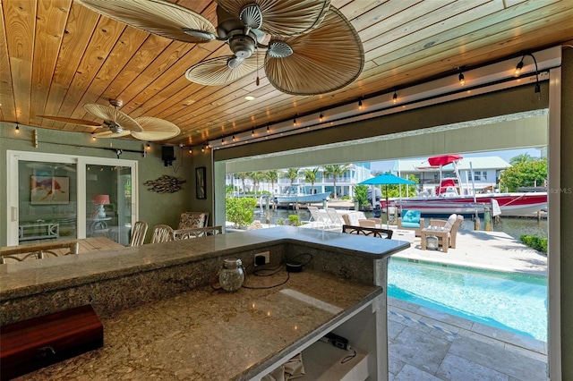 view of patio / terrace with ceiling fan