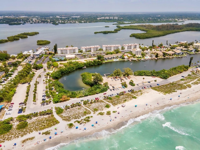 bird's eye view with a view of the beach and a water view