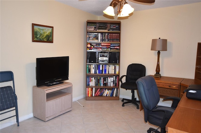 home office featuring tile flooring and ceiling fan