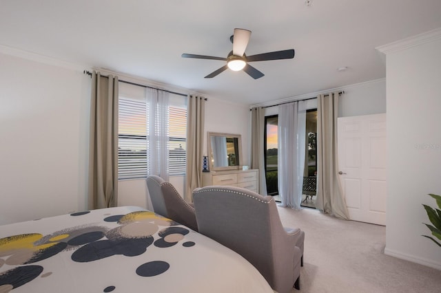 carpeted bedroom with ornamental molding, ceiling fan, and access to exterior