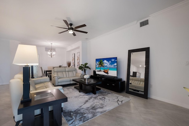 living room with ornamental molding, light tile flooring, and ceiling fan with notable chandelier