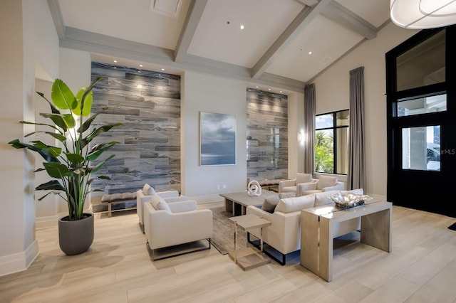 living room with high vaulted ceiling, beamed ceiling, and light hardwood / wood-style floors