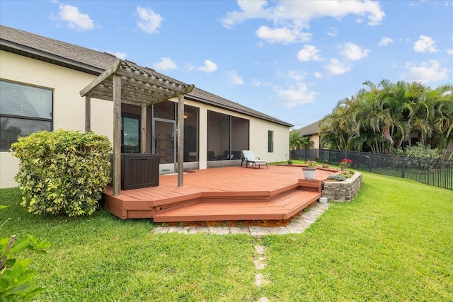 wooden terrace featuring a pergola and a lawn