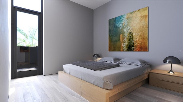 bedroom with light hardwood / wood-style floors