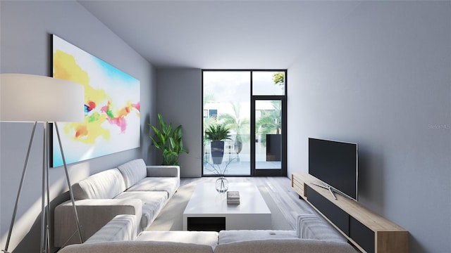 living room with light hardwood / wood-style floors and a wall of windows