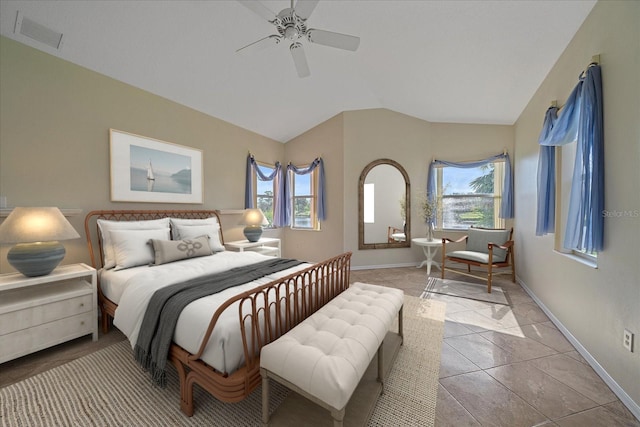 bedroom featuring light tile patterned floors, vaulted ceiling, and ceiling fan