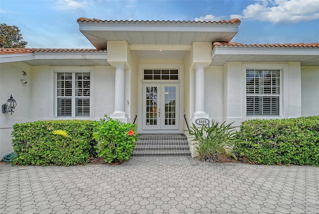 entrance to property featuring french doors