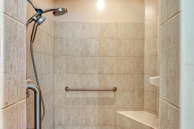 bathroom featuring a tile shower