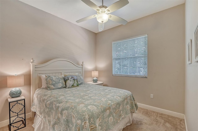 bedroom featuring ceiling fan and carpet floors