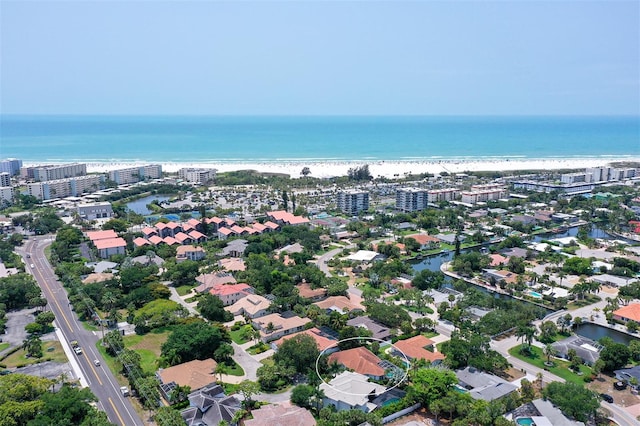 drone / aerial view with a view of the beach and a water view