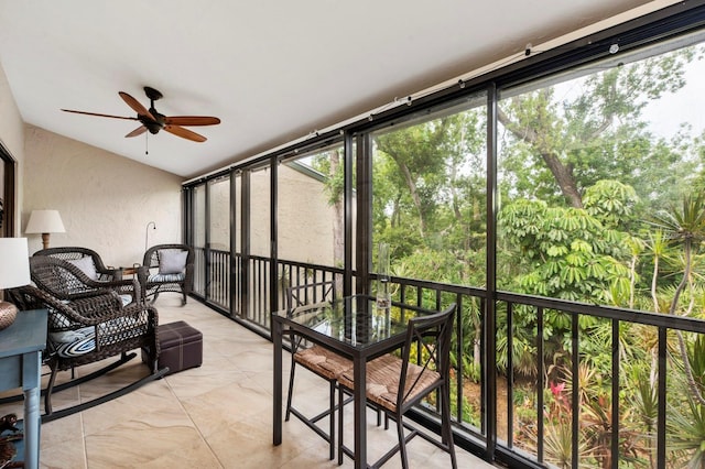 sunroom / solarium with ceiling fan