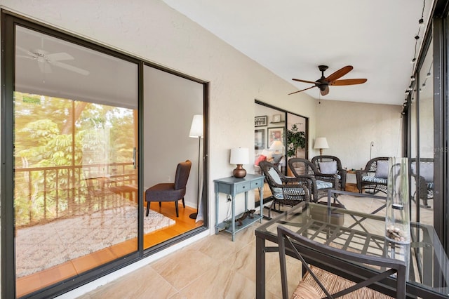 sunroom / solarium with vaulted ceiling