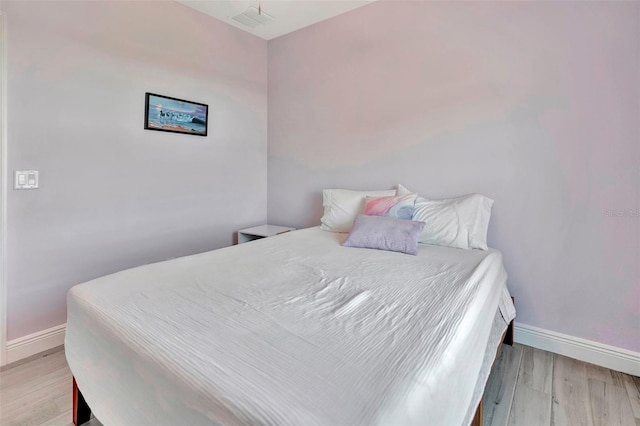 bedroom featuring light hardwood / wood-style flooring