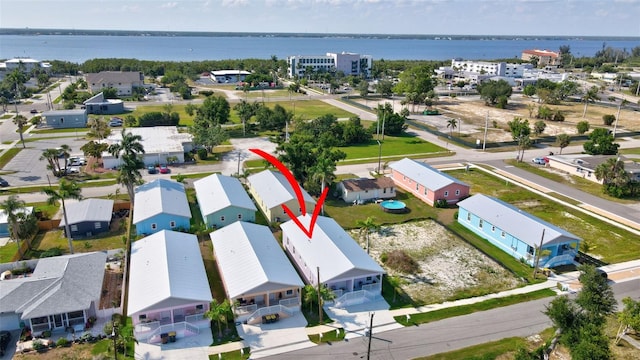 drone / aerial view featuring a water view