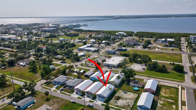 bird's eye view with a water view