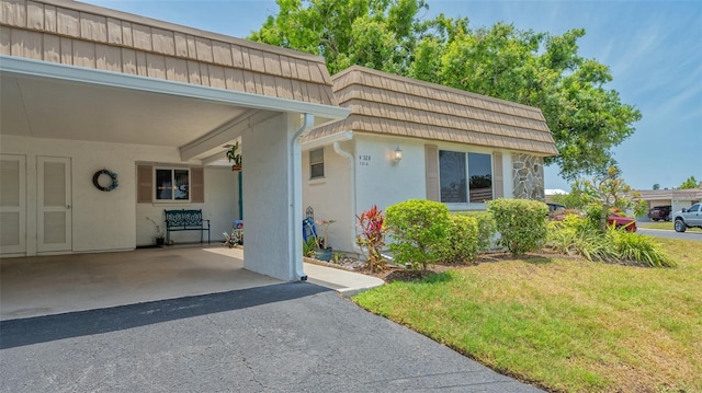 exterior space with a front yard