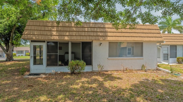 exterior space with a front yard