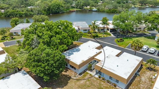 birds eye view of property featuring a water view