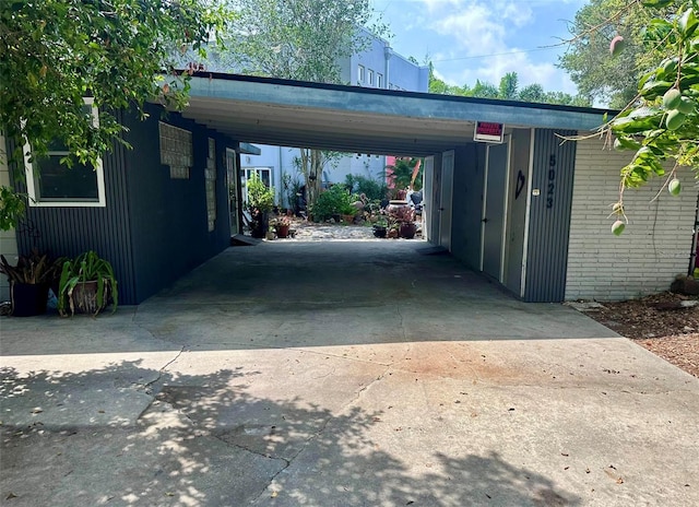 garage featuring a carport