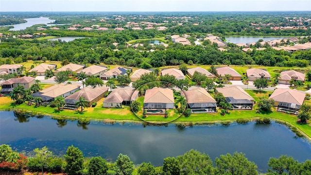 drone / aerial view featuring a water view