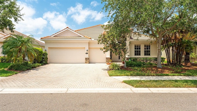 view of front of home with a garage