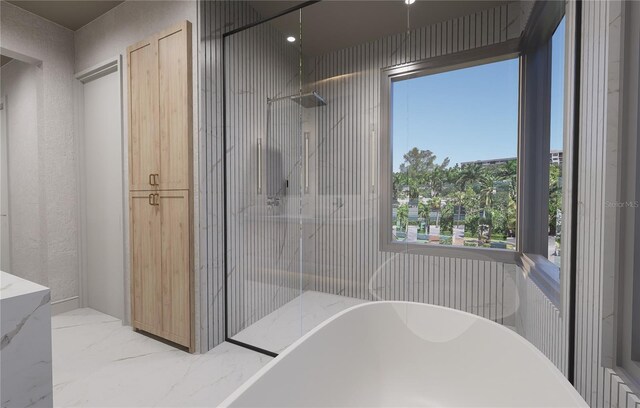 bathroom featuring separate shower and tub