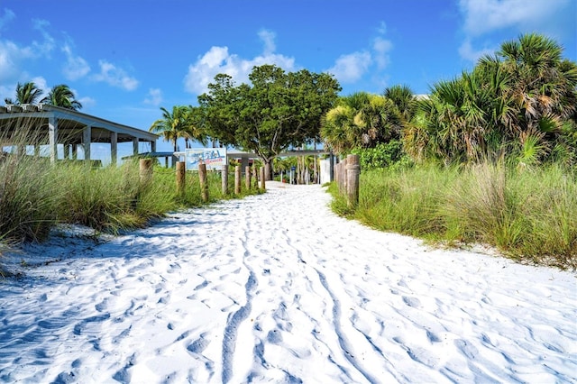 surrounding community featuring a water view