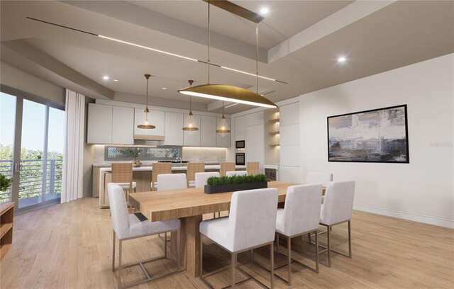 dining space with light wood-type flooring