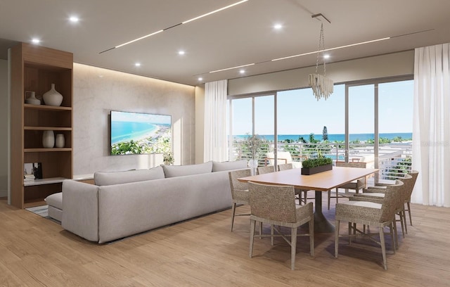 dining area featuring built in shelves and light hardwood / wood-style floors