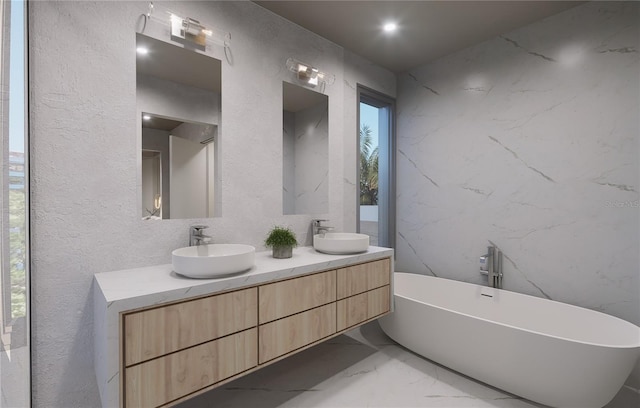 bathroom with vanity and a tub to relax in