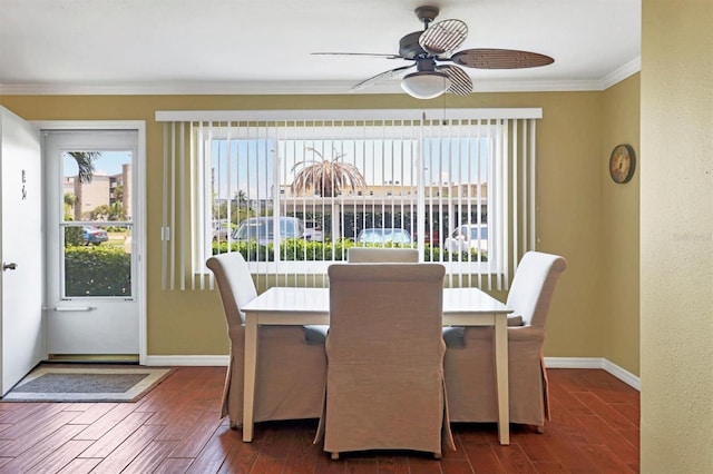 dining room featuring ceiling fan, dark hardwood / wood-style floors, and ornamental molding