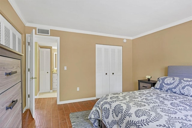 bedroom featuring a closet and ornamental molding