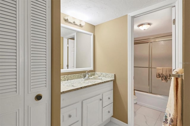 full bathroom with vanity, toilet, enclosed tub / shower combo, and a textured ceiling