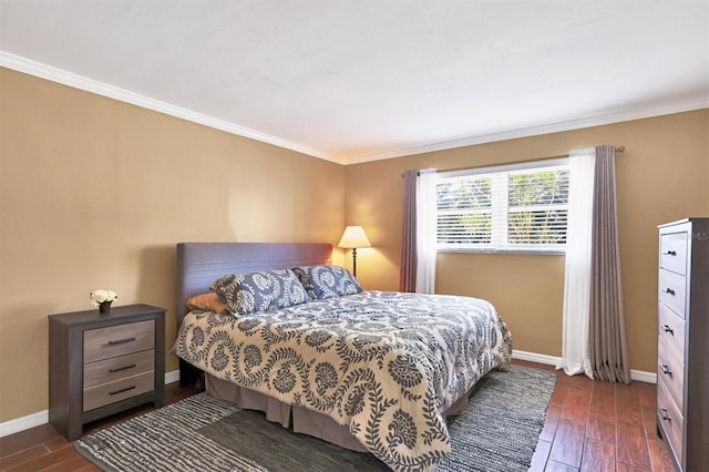 bedroom with baseboards, dark wood-style floors, and ornamental molding