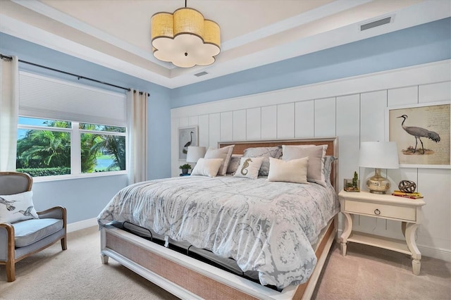 bedroom featuring light colored carpet