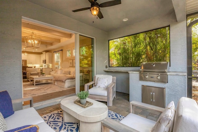 exterior space with ceiling fan and grilling area