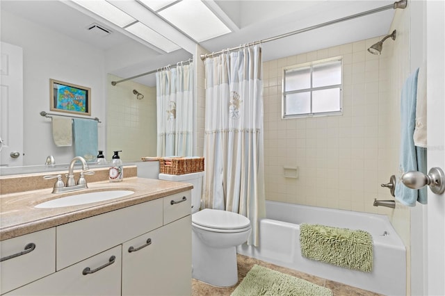 full bathroom with shower / bath combination with curtain, vanity, toilet, and tile floors