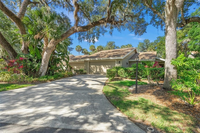 single story home featuring a garage