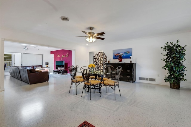 dining room featuring ceiling fan