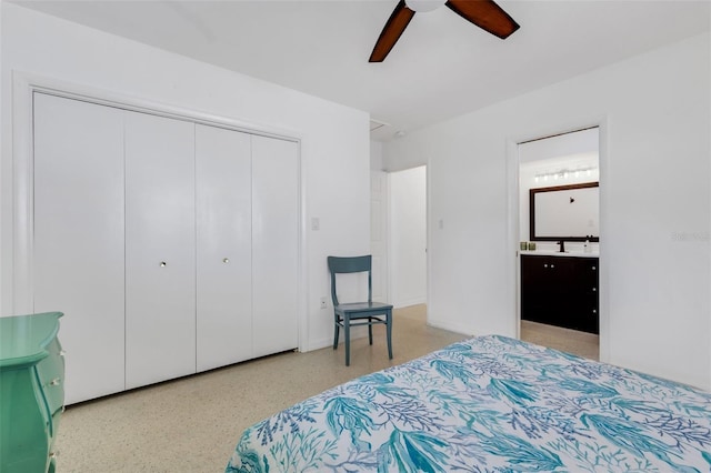 bedroom featuring connected bathroom, a closet, and ceiling fan