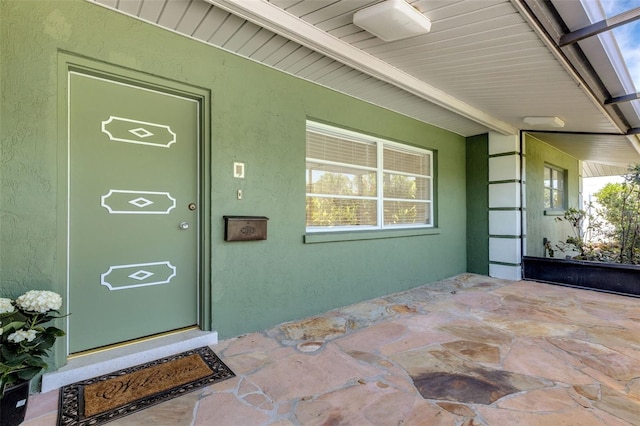 701 Armada Rd S, Venice, FL 34285 - view of exterior entry with stucco siding