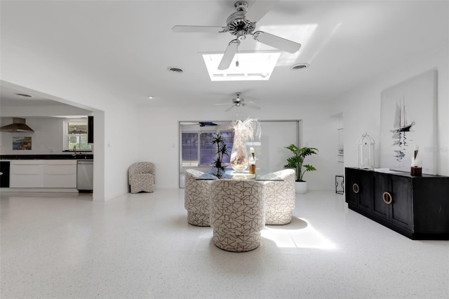 701 Armada Rd S, Venice, FL 34285 - hall featuring speckled floor, visible vents, and a skylight