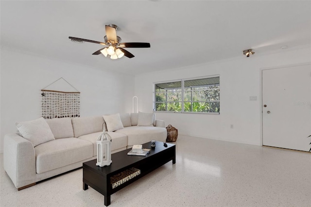 701 Armada Rd S, Venice, FL 34285 - living area with ornamental molding, speckled floor, and ceiling fan
