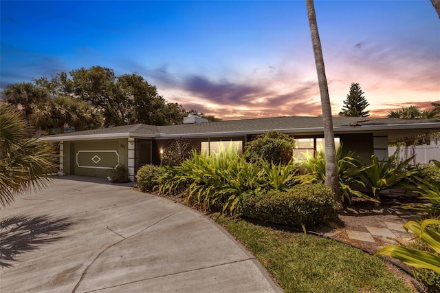701 Armada Rd S, Venice, FL 34285 - mid-century inspired home with a garage and driveway