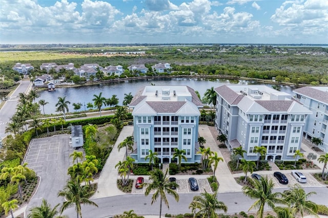 drone / aerial view with a water view